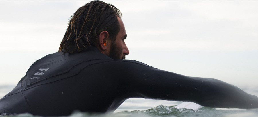 Why do surfers wear earplugs?